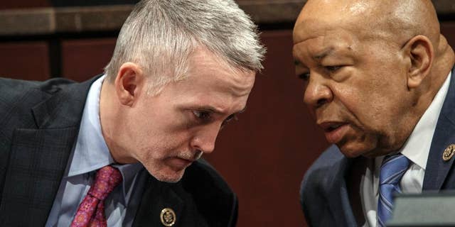 FILE - In this Jan. 27, 2015, file photo, House Benghazi Committee Chairman Rep. Trey Gowdy, R-S.C., left, confers with the committee's ranking member Rep. Elijah Cummings, D-Md., during the committee's hearing on Capitol Hill in Washington. The committee has missed a self-imposed deadline to issue a report “before summer," the latest setback for a probe that has gone on for more than two years and drawn scorn from Democrats who say the primary goal of the Republican-led investigation is to undermine Hillary Clinton's presidential bid.(AP Photo/J. Scott Applewhite, File)