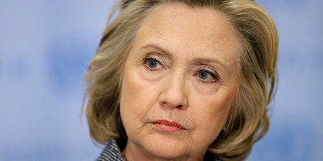 March 10, 2015: Hillary Rodham Clinton listens during a news conference at United Nations headquarters.