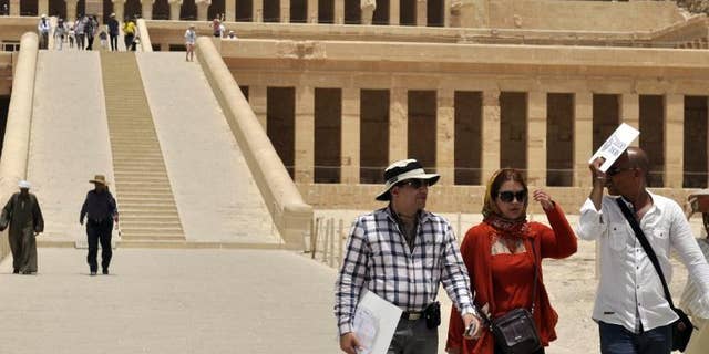 Iranian tourists visit the Temple of Hatshepsut in Egypt on June 3, 2013