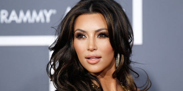 TV personality Kim Kardashian arrives at the 53rd annual Grammy Awards in Los Angeles