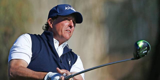 Phil Mickelson watches his tee shot at the second hole during the final round of the Waste Management Phoenix Open golf tournament Sunday, Feb. 5, 2017, in Scottsdale, Ariz. (AP Photo/Ross D. Franklin)