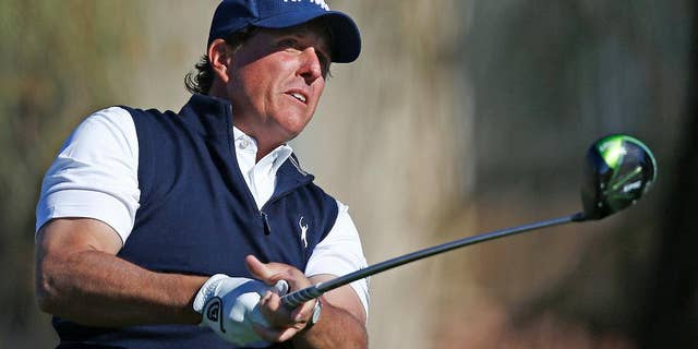 Phil Mickelson watches his tee shot at the second hole during the final round of the Waste Management Phoenix Open golf tournament Sunday, Feb. 5, 2017, in Scottsdale, Ariz. (AP Photo/Ross D. Franklin)