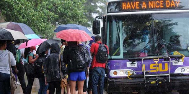 Sept. 17, 2012: LSU students wait for buses to take them off campus after a bomb scare.