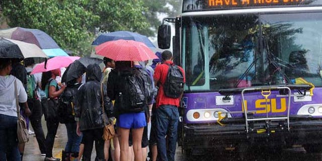 Sept. 17, 2012: LSU students wait for buses to take them off campus after a bomb scare.