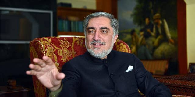 Abdullah Abdullah talks during an interview at his house in Afghanistan on March 19, 2013