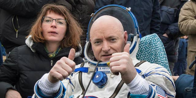 FILE - In this Wednesday, March 2, 2016, file photo provided by NASA, International Space Station (ISS) crew member Scott Kelly of the U.S. reacts after landing near the town of Dzhezkazgan, Kazakhstan.