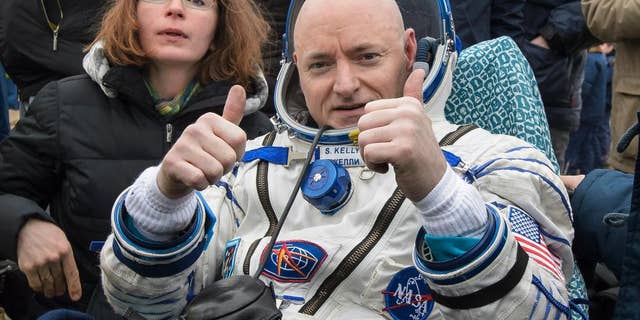 FILE - In this Wednesday, March 2, 2016, file photo provided by NASA, International Space Station (ISS) crew member Scott Kelly of the U.S. reacts after landing near the town of Dzhezkazgan, Kazakhstan.