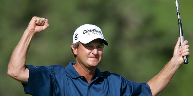 FILE - In this Sunday, Oct. 16, 2005 file photo, Wes Short Jr. reacts after sinking a birdie putt on the 18th hole to face Jim Furyk in the playoff during the final day of  Michelin Championship  in Las Vegas. Short first tried to qualify for the U.S. Open when he was a high school senior in Texas. He finally made it 34 years later at age 52. The U.S. Open is June 16-19, 2016 at Oakmont  (AP Photo/Jae C. Hong, File)