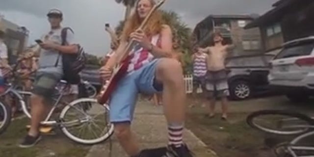 Lane Pittman played "The Star Spangled Banner" and Ted Nugent's "Stranglehold" during a July 4 gathering. It led to applause -- and a citation from the cops.