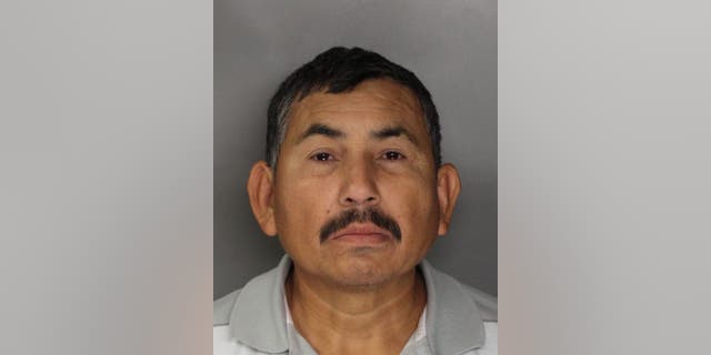In this handout photo released by the Sacramento County Sheriff's Department is Genaro Olaguez, who was arrested and sent back to Mexico on allegations that he killed eight government officials in Mexico. Olaquez was arrested in Sacramento, Calif., Tuesday, Dec. 3, 2013, in connection with the May 2, 2000, murders of a commissioner and seven other city officials in Sinaloa, Mexico.(AP Photo/Sacramento County Sheriff's Department)