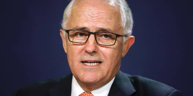 FILE - In this July 10, 2016 file photo, Australian Prime Minister Malcolm Turnbull speaks at the government offices in Sydney. Turnbull came under pressure from his own lawmakers on Thursday, July 14 to revise his economic agenda after his weakened coalition scraped through one of the nation's closest ever elections. (AP Photo/Rick Rycroft, File)