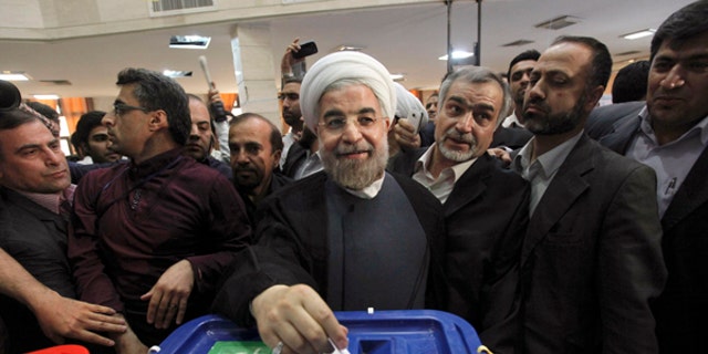 Iranian President Hasan Rowhani ran as a moderate, and the release of 11 political prisoners could be evidence of a shift in Iran. (AP)