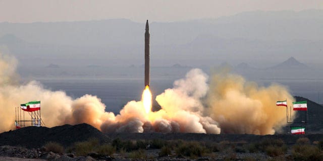 This photo released on Friday, Aug. 20, 2010, by the Iranian Defense Ministry, claims to show the launch of the Qiam-1 liquid-fueled missile by Iranian armed forces, at an undisclosed location. Iran's defense minister says military forces have successfully test-fired a missile with enhanced guidance systems to hit ground targets.