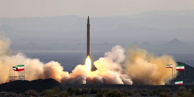 This photo released on Friday, Aug. 20, 2010, by the Iranian Defense Ministry, claims to show the launch of the Qiam-1 liquid-fueled missile by Iranian armed forces, at an undisclosed location. Iran's defense minister says military forces have successfully test-fired a missile with enhanced guidance systems to hit ground targets.