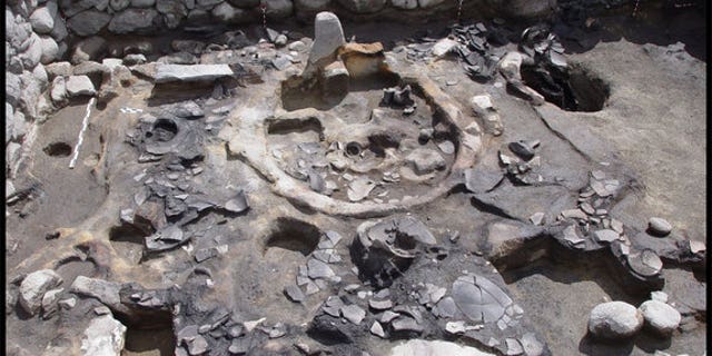 A shrine excavated at the entrance of a fortress' west terrace in Gegharot in Armenia. The stone stele like would've been a focal point for rituals practiced there some 3,300 years ago.