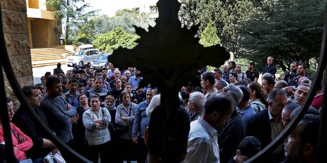 Syrian and Iraqi Christians have fled ISIS and ended up in Lebanon, among other locations. (AP Photo/Bilal Hussein)