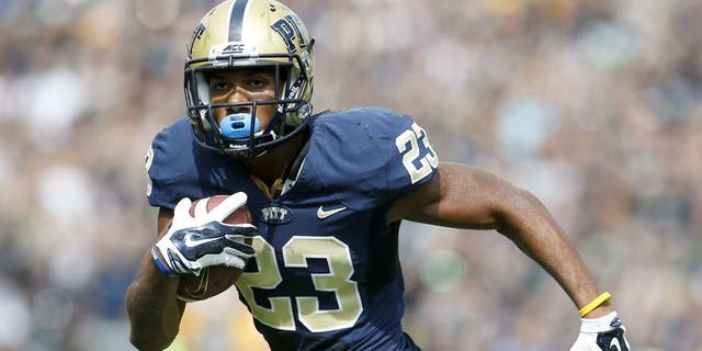 Sep 20, 2014; Pittsburgh, PA, USA; Pittsburgh Panthers wide receiver Tyler Boyd (23) runs after a pass reception against the Iowa Hawkeyes during the second quarter at Heinz Field. Mandatory Credit: Charles LeClaire-USA TODAY Sports