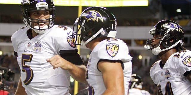 PITTSBURGH, PA - OCTOBER 01: Joe Flacco #5 and Michael Campanaro of the Baltimore Ravens celebrate after Campanaro scored a 1st quarter touchdown during the game against the Pittsburgh Steelers at Heinz Field on October 1, 2015 in Pittsburgh, Pennsylvania. (Photo by Justin K. Aller/Getty Images)