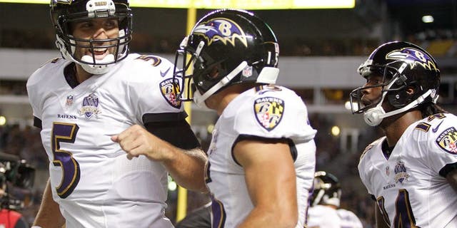 PITTSBURGH, PA - OCTOBER 01: Joe Flacco #5 and Michael Campanaro of the Baltimore Ravens celebrate after Campanaro scored a 1st quarter touchdown during the game against the Pittsburgh Steelers at Heinz Field on October 1, 2015 in Pittsburgh, Pennsylvania. (Photo by Justin K. Aller/Getty Images)