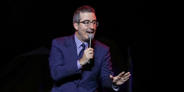 FILE - In this Nov. 7, 2017 file photo, comedian John Oliver performs at the 11th Annual Stand Up for Heroes benefit in New York. Oliver's show, which begins its fifth season on Sunday. (Photo by Brent N. Clarke/Invision/AP, File)