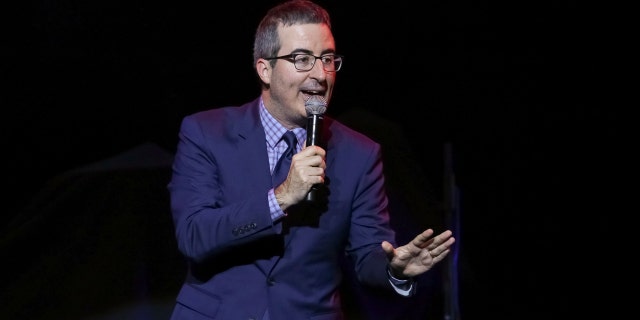FILE - In this Nov. 7, 2017 file photo, comedian John Oliver performs at the 11th Annual Stand Up for Heroes benefit in New York. Oliver's show, which begins its fifth season on Sunday. (Photo by Brent N. Clarke/Invision/AP, File)