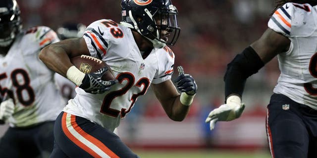 Sep 14, 2014; Santa Clara, CA, USA; Chicago Bears Kyle Fuller (23) runs after intercepting San Francisco 49ers quarterback Colin Kaepernick (7) (not pictured) in the fourth quarter of their NFL football game at Levis Stadium. Mandatory Credit: Lance Iversen-USA TODAY Sports