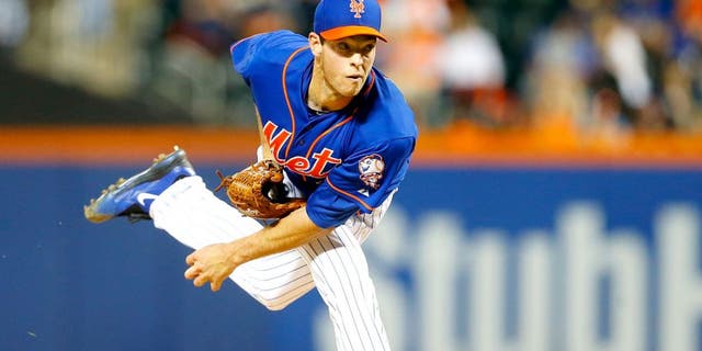 NEW YORK, NY - SEPTEMBER 18: (NEW YORK DAILIES OUT) Steven Matz #32 of the New York Mets pitches in the first inning against the New York Yankees at Citi Field on September 18, 2015 in the Flushing neighborhood of the Queens borough of New York City. The Mets defeated the Yankees 5-1. (Photo by Jim McIsaac/Getty Images)