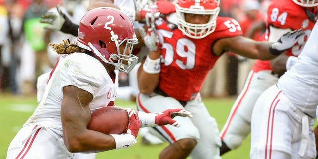 Oct 3, 2015; Athens, GA, USA; Alabama Crimson Tide running back Derrick Henry (2) runs the ball during the first quarter Georgia Bulldogs at Sanford Stadium. Mandatory Credit: John David Mercer-USA TODAY Sports