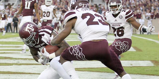 COLLEGE STATION, TX - OCTOBER 03: Ricky Seals-Jones #9 of the Texas A&M Aggies catches a touchdown pass while being defended by Taveze Calhoun #23 of the Mississippi State Bulldogs in the first quarter on October 3, 2015 at Kyle Field in College Station, Texas. (Photo by Thomas B. Shea/Getty Images)