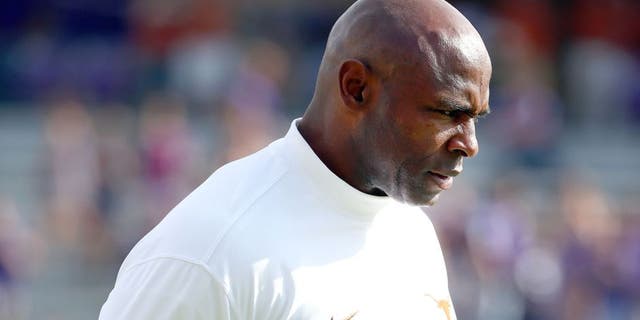 FORT WORTH, TX - OCTOBER 03: Head coach Charlie Strong of the Texas Longhorns looks on as the Longhorns prepare to take on the TCU Horned Frogs at Amon G. Carter Stadium on October 3, 2015 in Fort Worth, Texas. (Photo by Tom Pennington/Getty Images)
