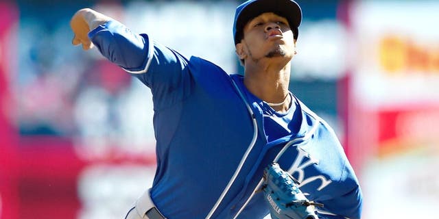 MINNEAPOLIS, MN - OCTOBER 3: Yordano Ventura #30 of the Kansas City Royals delivers a pitch against the Minnesota Twins during the first inning of the game on October 3, 2015 at Target Field in Minneapolis, Minnesota. (Photo by Hannah Foslien/Getty Images)