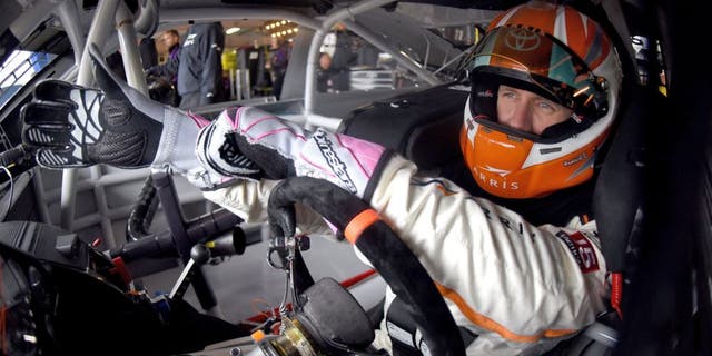 DOVER, DE - OCTOBER 03: Carl Edwards, driver of the #19 ARRIS Toyota, sits in his car in the garage area during practice for the NASCAR Sprint Cup Series AAA 400 at Dover International Speedway on October 3, 2015 in Dover, Delaware. (Photo by Jonathan Moore/Getty Images)