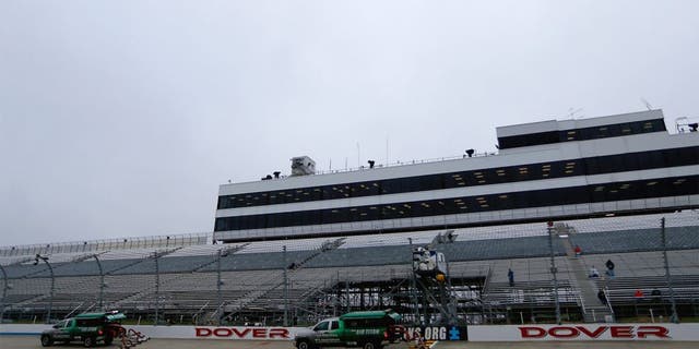 DOVER, DE - OCTOBER 03: A view of track workers drying the race track before practice for the NASCAR Sprint Cup Series AAA 400 at Dover International Speedway on October 3, 2015 in Dover, Delaware. (Photo by Jeff Zelevansky/NASCAR via Getty Images)