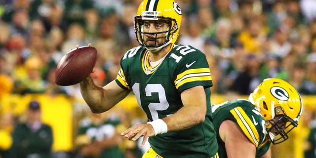 Sep 20, 2015; Green Bay, WI, USA; Green Bay Packers quarterback Aaron Rodgers (12) against the Seattle Seahawks during the second half at Lambeau Field. Packers won 27-17. Mandatory Credit: Ray Carlin-USA TODAY Sports