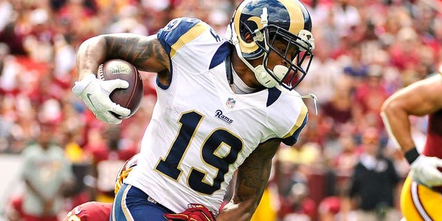 Sep 20, 2015; Landover, MD, USA; St. Louis Rams wide receiver Chris Givens (19) is tackled by Washington Redskins inside linebacker Keenan Robinson (52) during the second half at FedEx Field. The Washington Redskins won 24 - 10. Mandatory Credit: Brad Mills-USA TODAY Sports