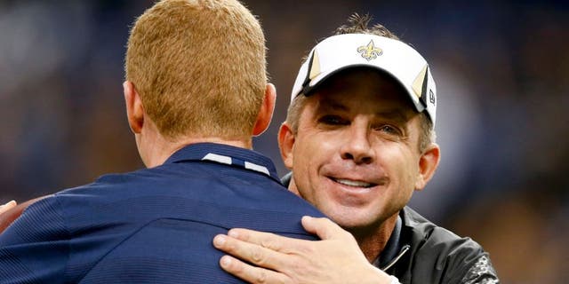 Nov 10, 2013; New Orleans, LA, USA; New Orleans Saints head coach Sean Payton greets Dallas Cowboys head coach Jason Garrett prior to a game at Mercedes-Benz Superdome. Mandatory Credit: Derick E. Hingle-USA TODAY Sports