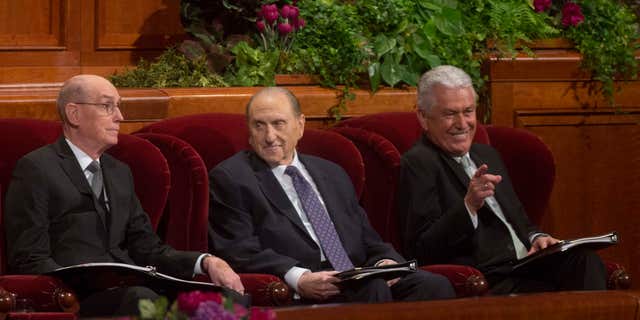 Oct. 3, 2015: Henry B. Eyring, First Counselor in the First Presidency, left, President Thomas S. Monson, of The Church of Jesus Christ of Latter-day Saints, middle, and Dieter F. Uchtdorf, Second Counselor in the First Presidency, right, attend the opening session of the two-day Mormon church conference.
