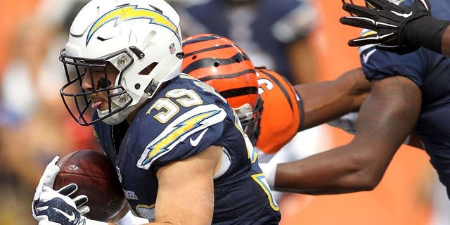 CINCINNATI, OH - SEPTEMBER 20: Danny Woodhead #39 of the San Diego Chargers carries the ball during the third quarter of the game against the Cincinnati Bengals at Paul Brown Stadium on September 20, 2015 in Cincinnati, Ohio. (Photo by John Grieshop/Getty Images)