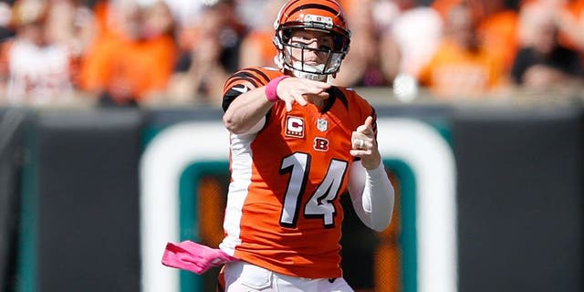 CINCINNATI, OH - OCTOBER 4: Andy Dalton #14 of the Cincinnati Bengals throws a pass during the first quarter of the game against the Kansas City Chiefs at Paul Brown Stadium on October 4, 2015 in Cincinnati, Ohio. (Photo by Joe Robbins/Getty Images)