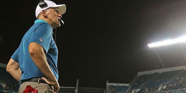 MIAMI GARDENS, FL - SEPTEMBER 03: Head coach Joe Philbin of the Miami Dolphins looks on during a preseason game against the Tampa Bay Buccaneers at Sun Life Stadium on September 3, 2015 in Miami Gardens, Florida. (Photo by Mike Ehrmann/Getty Images)