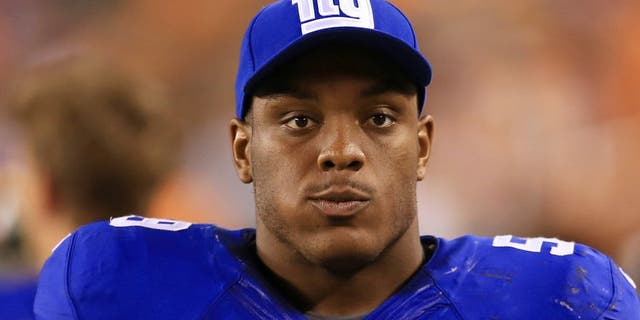 Aug 14, 2015; Cincinnati, OH, USA; New York Giants outside linebacker Devon Kennard (59) in a preseason NFL football game against the Cincinnati Bengals at Paul Brown Stadium. Mandatory Credit: Andrew Weber-USA TODAY Sports