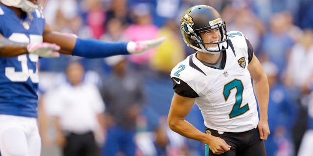 Jacksonville Jaguars' Jason Myers (2) watches as he misses a potential game winning field goal as Indianapolis Colts' Josh Thomas (35) reacts late in the second half of an NFL football game Sunday, Oct. 4, 2015, in Indianapolis. (AP Photo/Michael Conroy)
