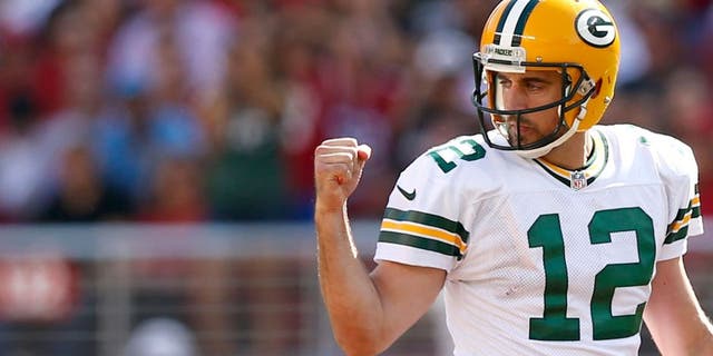 SANTA CLARA, CA - OCTOBER 04: Quarterback Aaron Rodgers #12 of the Green Bay Packers reacts to a first down against the San Francisco 49ers during their NFL game at Levi's Stadium on October 4, 2015 in Santa Clara, California. (Photo by Ezra Shaw/Getty Images)