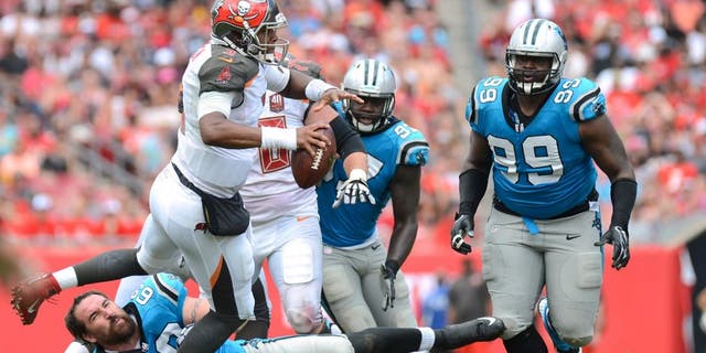 Oct 4, 2015; Tampa, FL, USA; Tampa Bay Buccaneers quarterback Jameis Winston (3) runs with the ball in the first half against the Carolina Panthers at Raymond James Stadium. Mandatory Credit: Jonathan Dyer-USA TODAY Sports