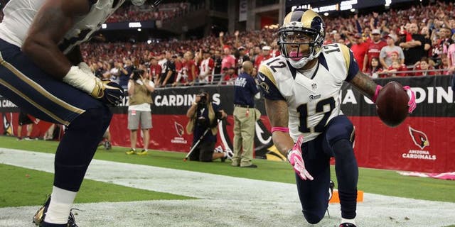 GLENDALE, AZ - OCTOBER 04: Wide receiver Stedman Bailey #12 of the St. Louis Rams (right) celebrates his third quarter touchdown with wide receiver Kenny Britt #18 (left) during the NFL game against the Arizona Cardinals at the University of Phoenix Stadium on October 4, 2015 in Glendale, Arizona. (Photo by Christian Petersen/Getty Images)