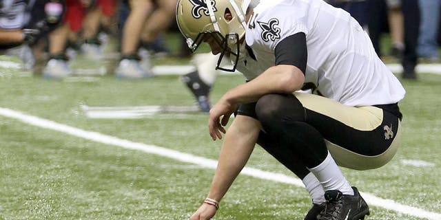 Oct 4, 2015; New Orleans, LA, USA; New Orleans Saints kicker Zach Hocker (2) reacts after missing a field goal at the end of the fourth quarter against the Dallas Cowboys at Mercedes-Benz Superdome. The Saints won 26-20. Mandatory Credit: Chuck Cook-USA TODAY Sports