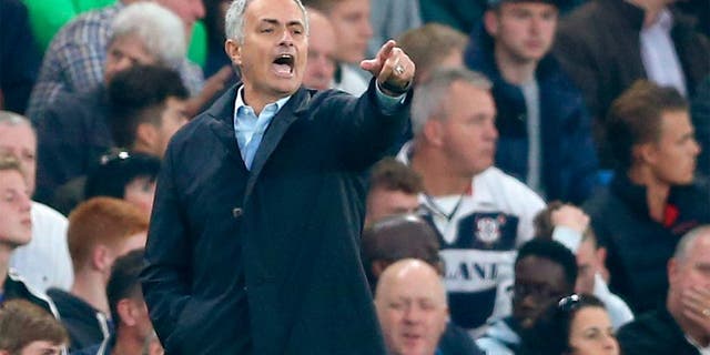 Chelsea's Portuguese manager Jose Mourinho gestures during the English Premier League football match between Chelsea and Southampton at Stamford Bridge in London on October 3, 2015. AFP PHOTO / JUSTIN TALLIS RESTRICTED TO EDITORIAL USE. No use with unauthorized audio, video, data, fixture lists, club/league logos or 'live' services. Online in-match use limited to 75 images, no video emulation. No use in betting, games or single club/league/player publications. (Photo credit should read JUSTIN TALLIS/AFP/Getty Images)