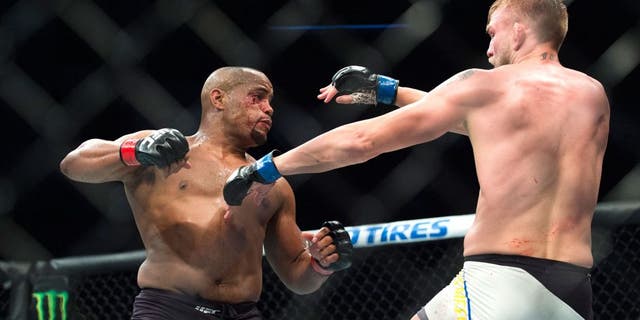 HOUSTON, TX - OCTOBER 3: Daniel Cormier throws a punch against Alexander Gustafsson during UFC 192 at the Toyota Center on October 3, 2015 in Houston, Texas. (Photo by Cooper Neill/Zuffa LLC/Zuffa LLC via Getty Images)