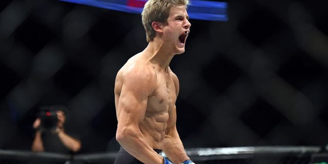 HOUSTON, TX - OCTOBER 03: Sage Northcutt celebrates after defeating Francisco Trevino in their lightweight bout during the UFC 192 event at the Toyota Center on October 3, 2015 in Houston, Texas. (Photo by Jeff Bottari/Zuffa LLC/Zuffa LLC via Getty Images)