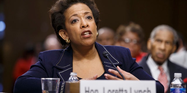 Attorney General nominee Loretta Lynch testifies on Capitol Hill in Washington, Wednesday, Jan. 28, 2015, before the Senate Judiciary Committee's hearing on her nomination. Lynch defended President Barack Obama's decision to shelter millions of immigrants from deportation though they live in the country illegally but she said they have no right to citizenship under the law. If confirmed, Lynch would become the nation's first black female attorney general. It is the first confirmation proceeding since Republicans took control of the Senate this month. (AP Photo/J. Scott Applewhite)